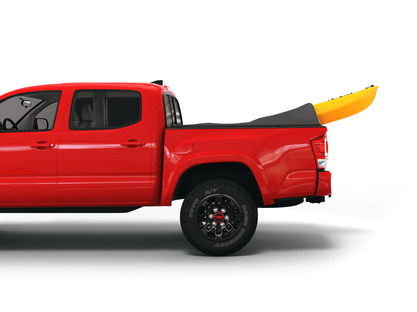 Red Toyota Tacoma with yellow kayak under sawtooth stretch truck bed cover